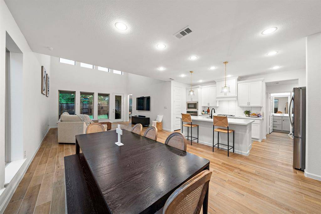 The breakfast room features awindow with views in your backyard.