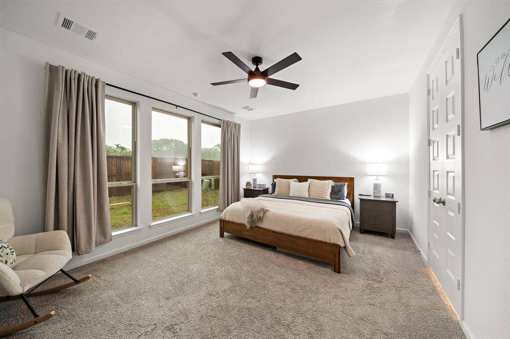 Step into the sanctuary of theprimary bedroom.