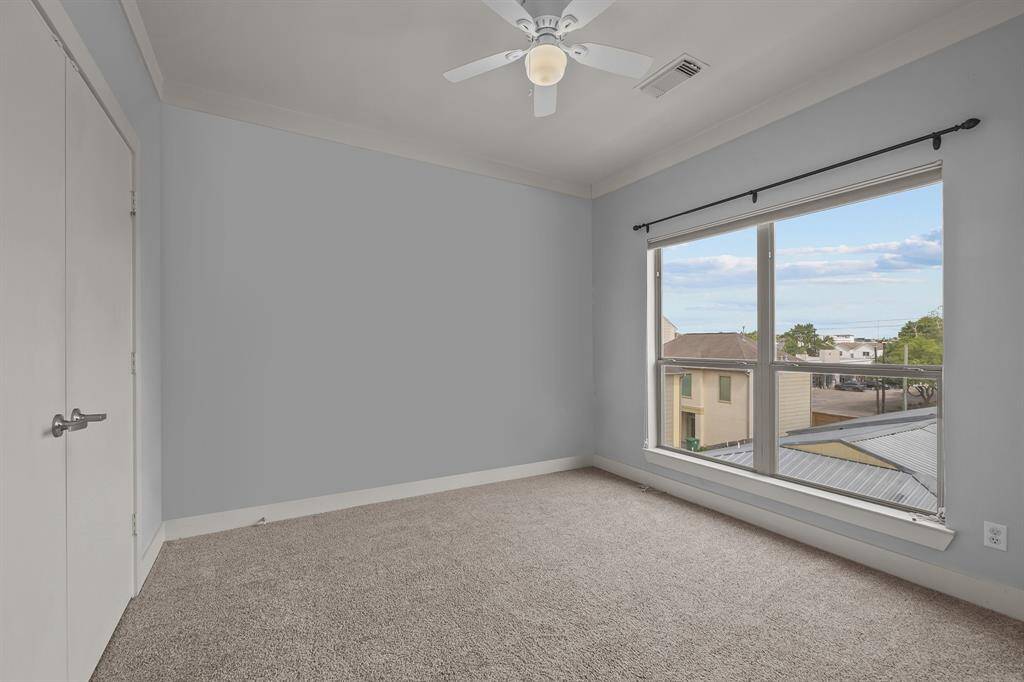 1st floor bedroom overlooking the patio
