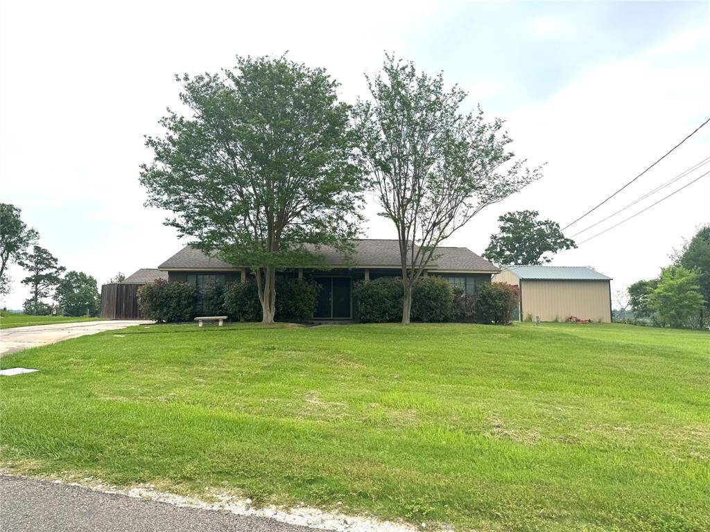 sits on 2 large lots that are just inches from an half an acre with its own well separate from the public water source for the sprinkler system that will always enlisted that you have a beautiful yard