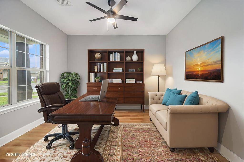 Virtually staged as a home office.
