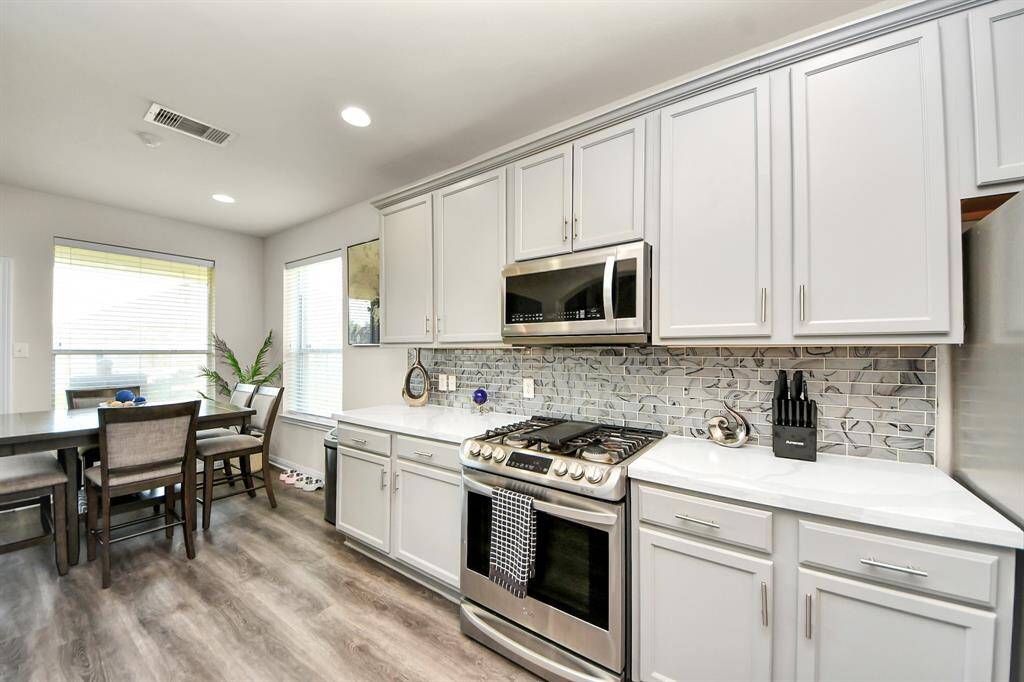 The updated kitchen has modern finishes which tie in well with the rest of the home.