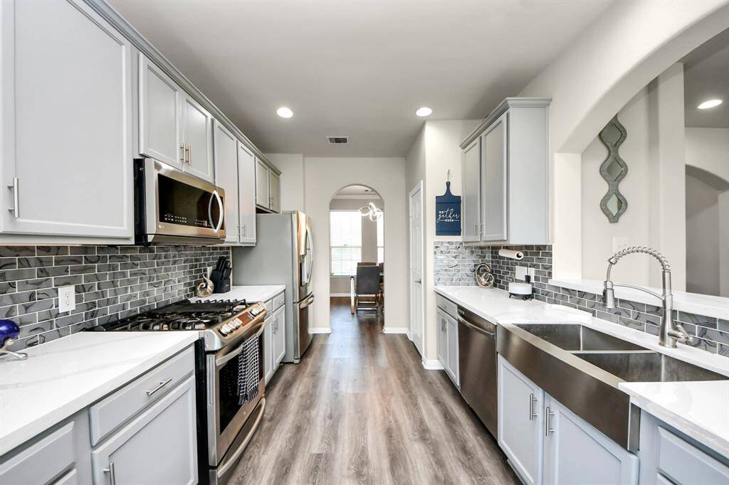 Stainless steel appliances adds a sleek design element.