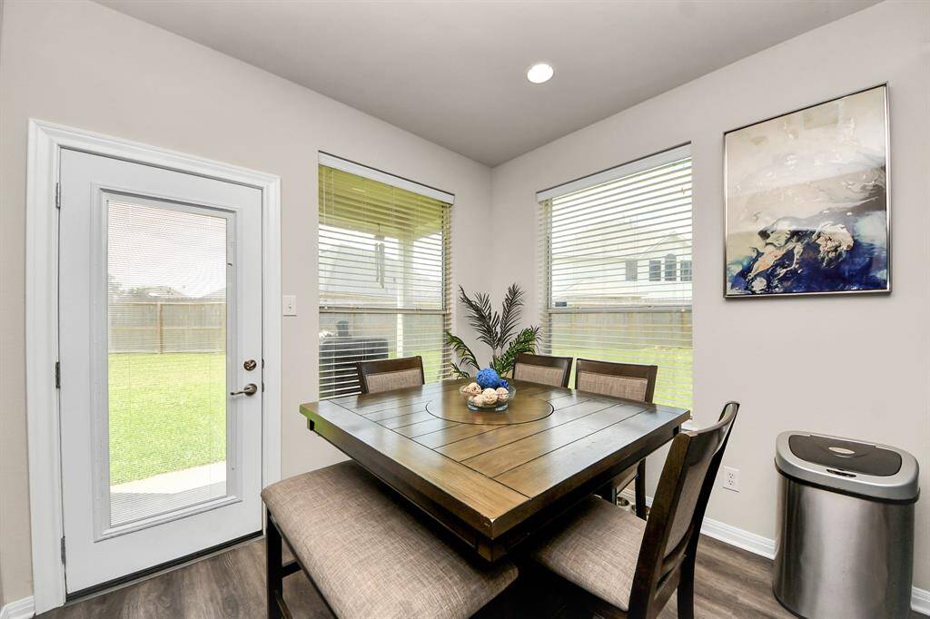 Breakfast area is located right next to the kitchen.