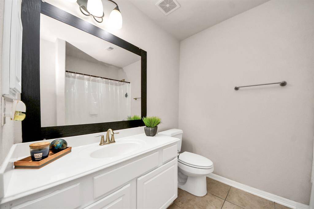 Secondary bathroom is located between secondary bedrooms #2 and #3.