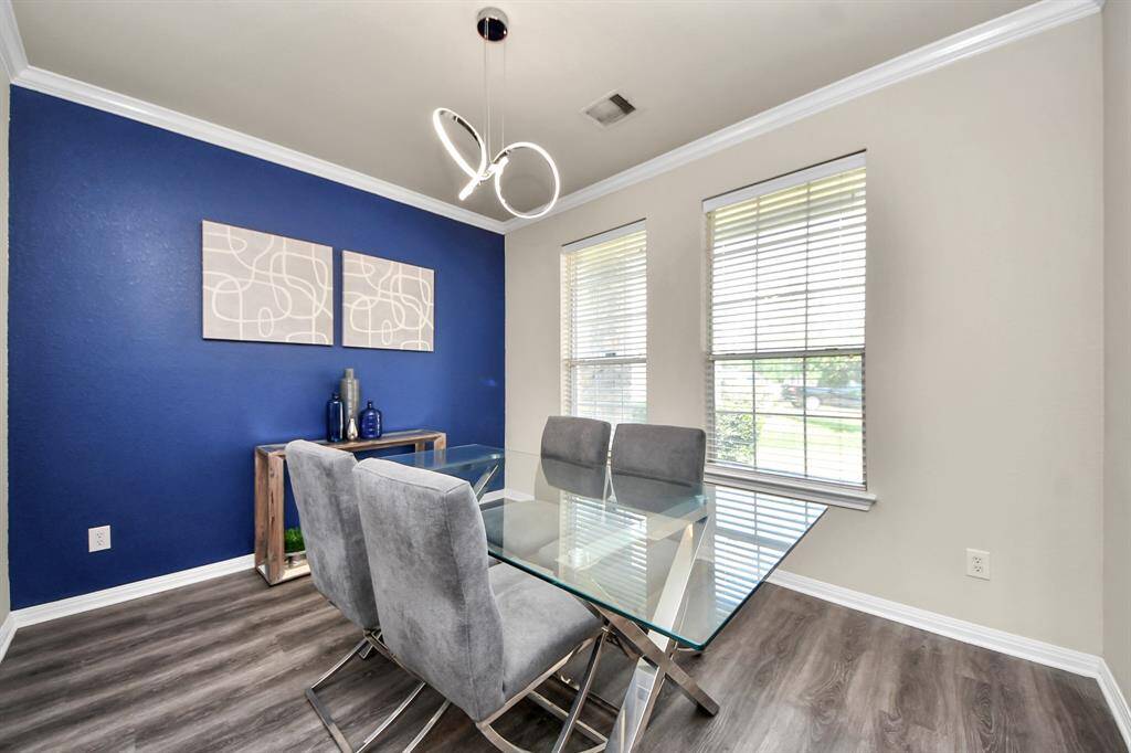 Situated at the front of the home, the dining room is a great space to welcome guests.