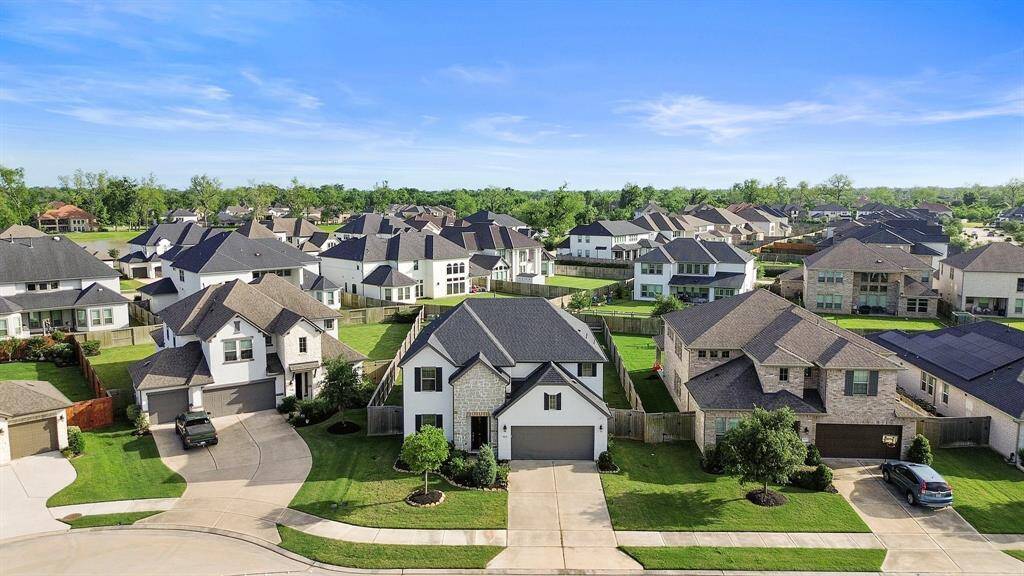 Located in a quiet cul-de-sac, this home sits in a beautifully maintained neighborhood with wide streets and mature landscaping.