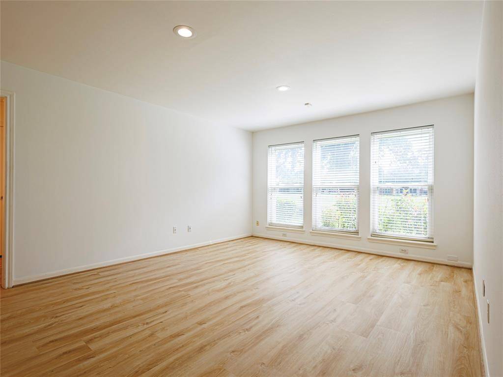Master bedroom with new flooring & great views of the golf course.