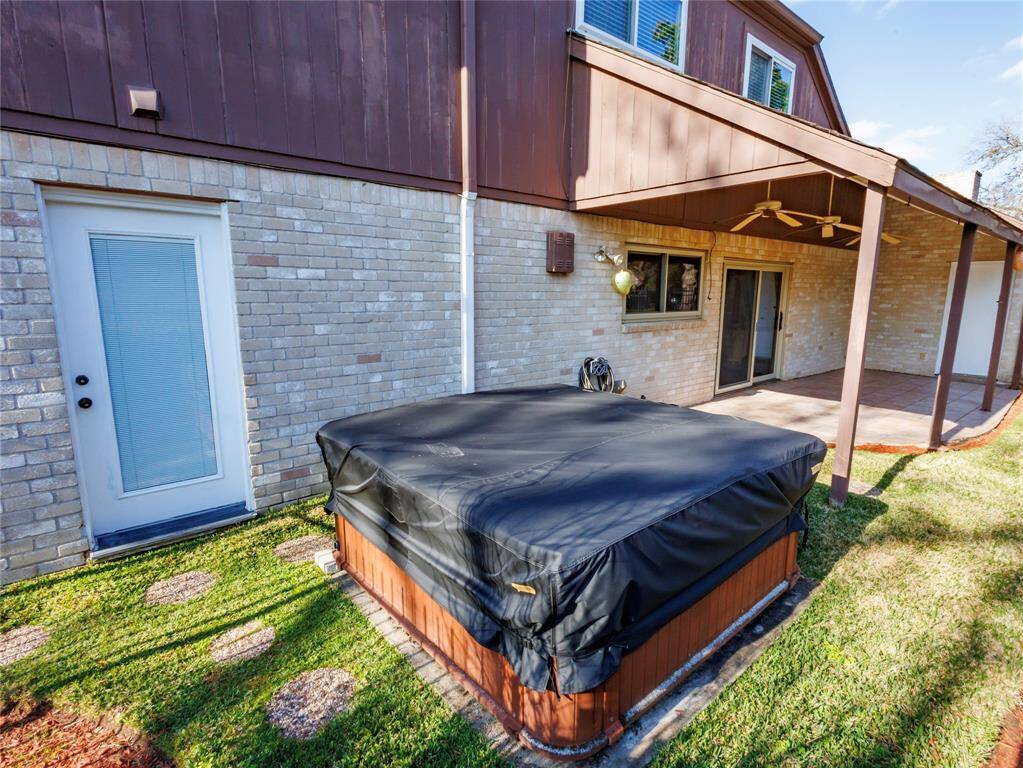 Relax your muscles in outddoor hot tub right off master bath.