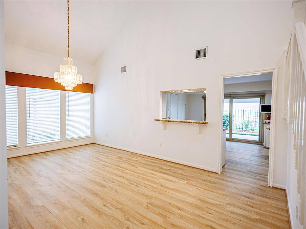 Entertain comfortably in dining room with new Luxury Vinyl flooring.