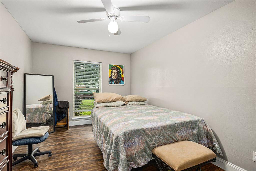 Guest bedroom with window to the front of the home