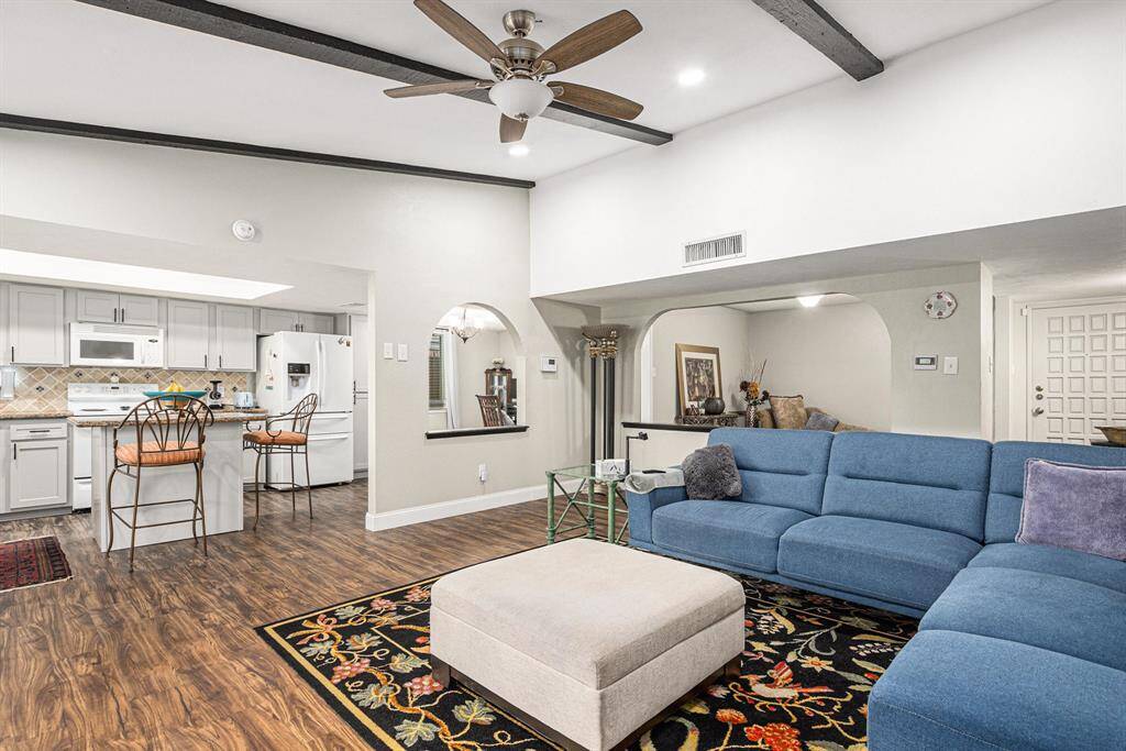 Living room is at the heart of the home open to the kitchen area