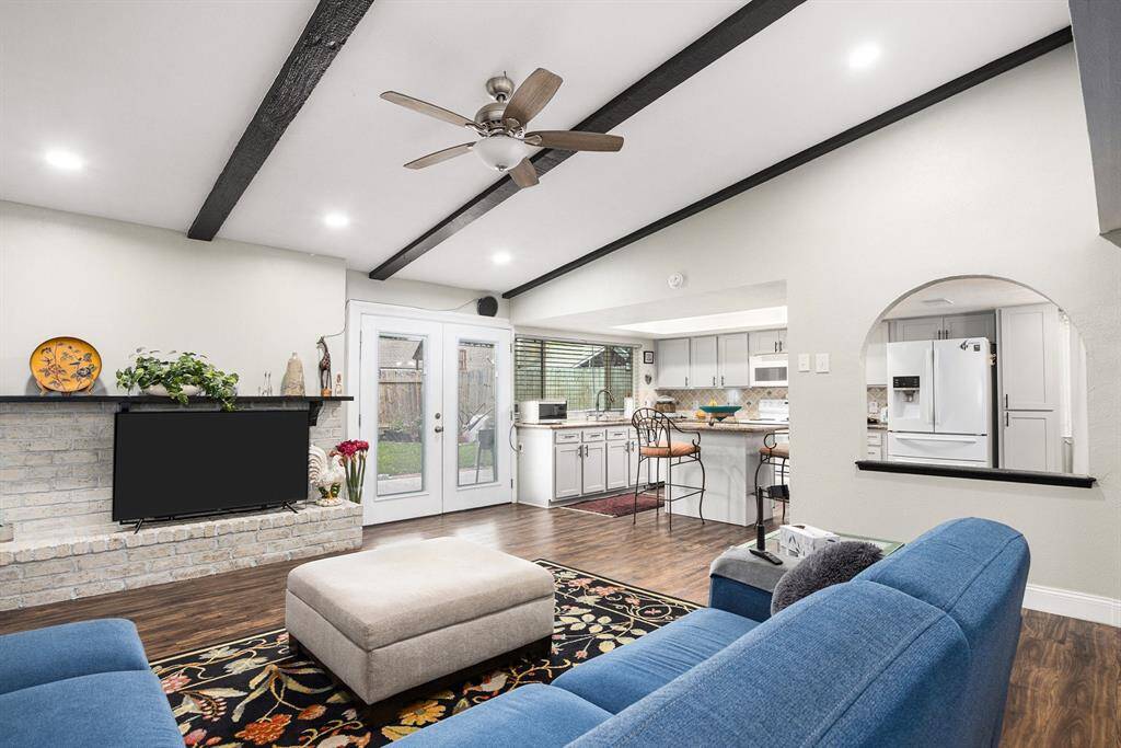 This home has one fireplace at the center of the living area