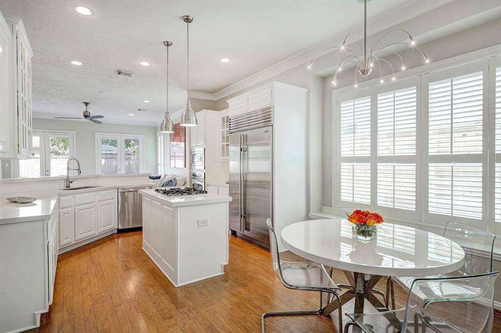 Breakfast nook with designer light fixtures