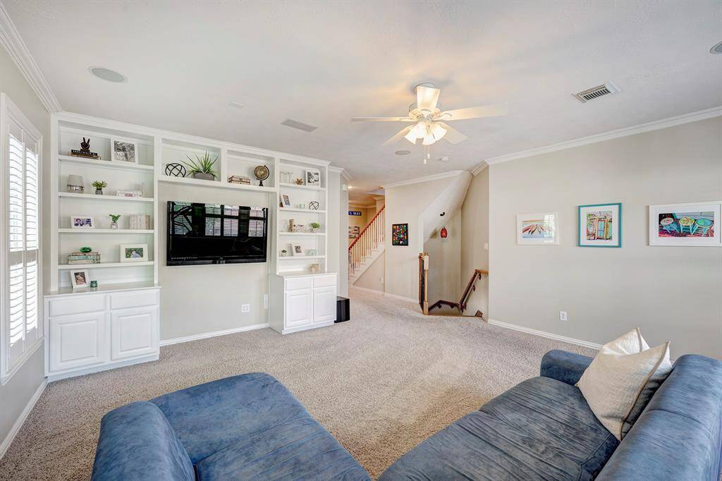 Cozy but spacious game room on the second floor complete with a built-in library and surround sound