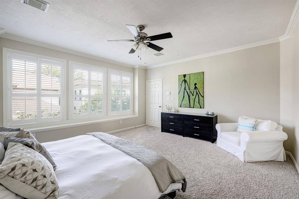 Second of two primary suites, this one is on the second floor with room for a sitting area