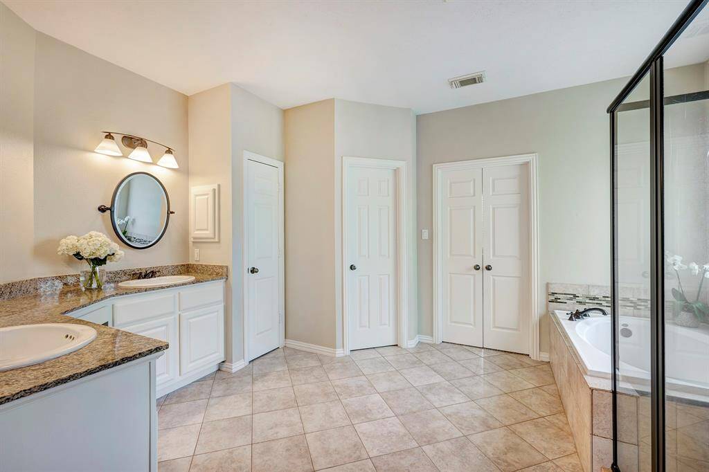 So much space and so much storage in this primary bathroom