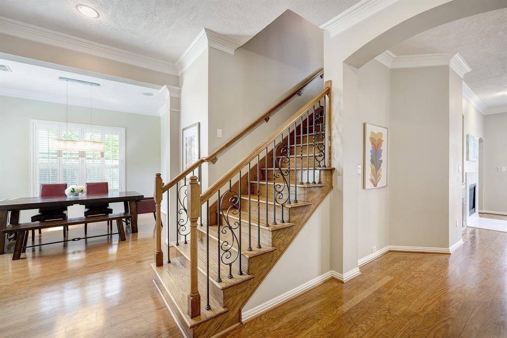 Entryway with formal dining on the left and living straight ahead