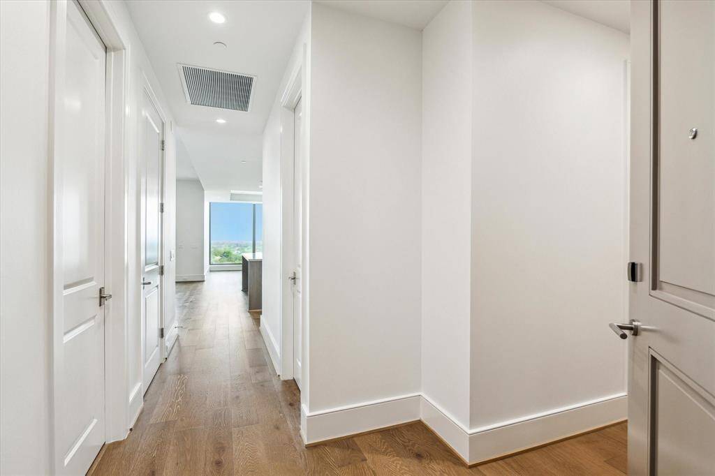 Alternate view of living, dining and kitchen combination. Photo is virtually staged