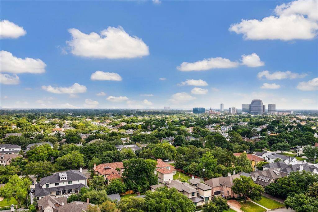 Embrace the dynamic cityscape views from the primary bedroom