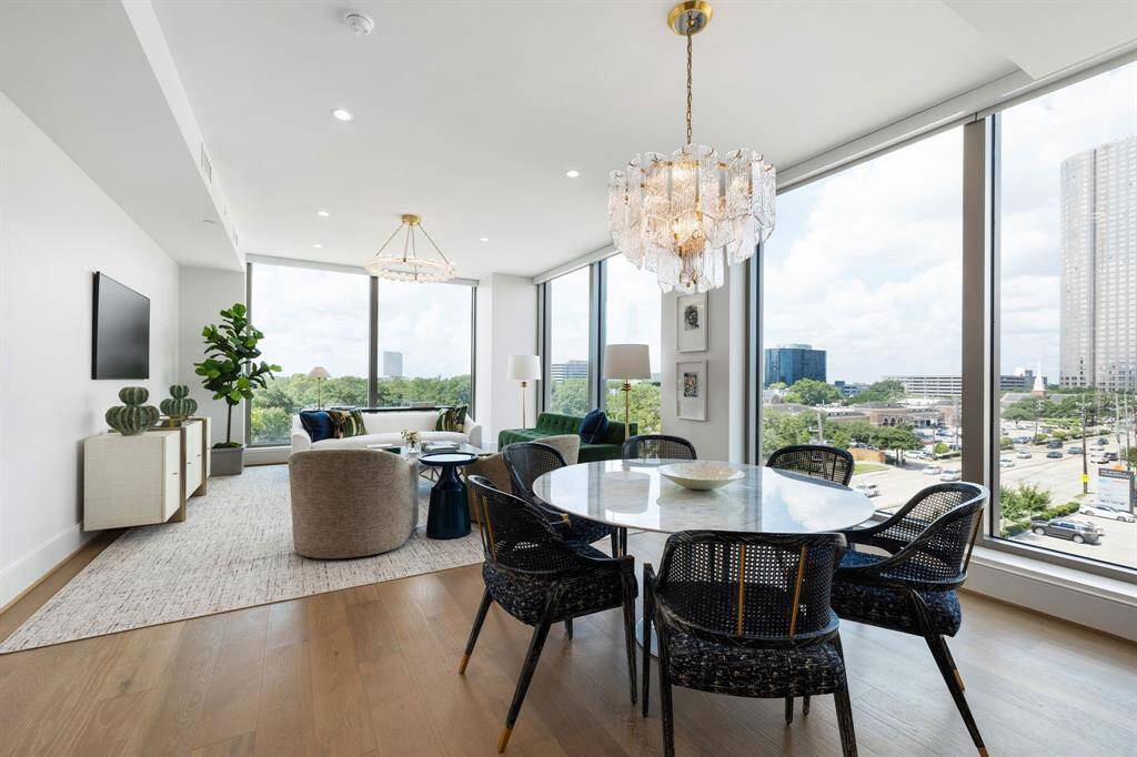 Seamless living in an open-concept layout, framed by breathtaking views of the city skyline.