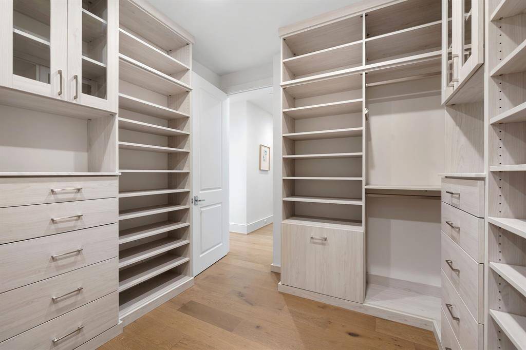 Primary closet with an option for an up-graded custom-builtins and cabinetry