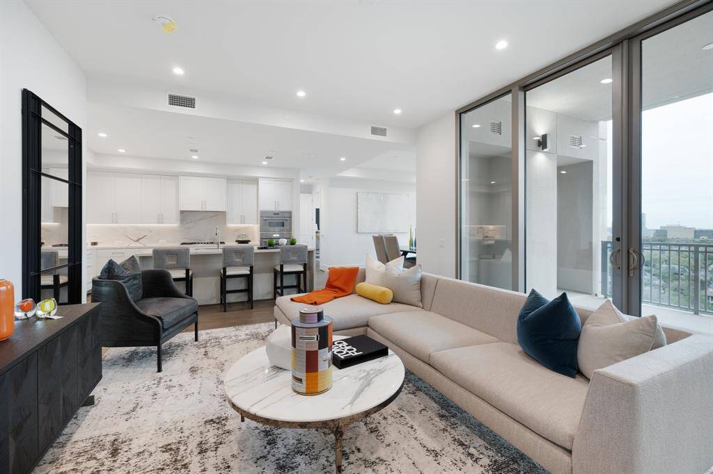 Effortless flow between the living, dining, and kitchen areas in this thoughtfully designed open-concept floor plan.