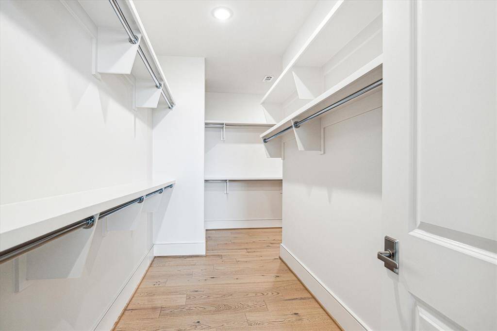 Huge Walk-in primary dressing room.
