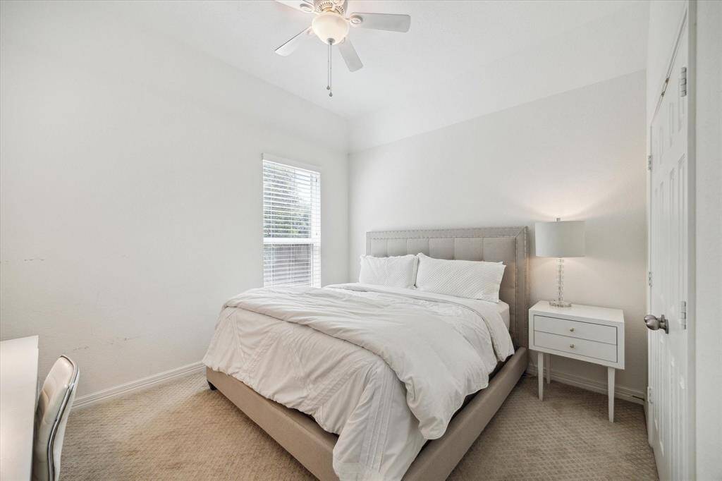 Located in the back right corner of the home, this spacious guest suite offers exceptional privacy and comfort. Large enough to accommodate a king-sized bed, writing desk, and TV, it also features its own private bathroom—perfect for overnight guests or multigenerational living.