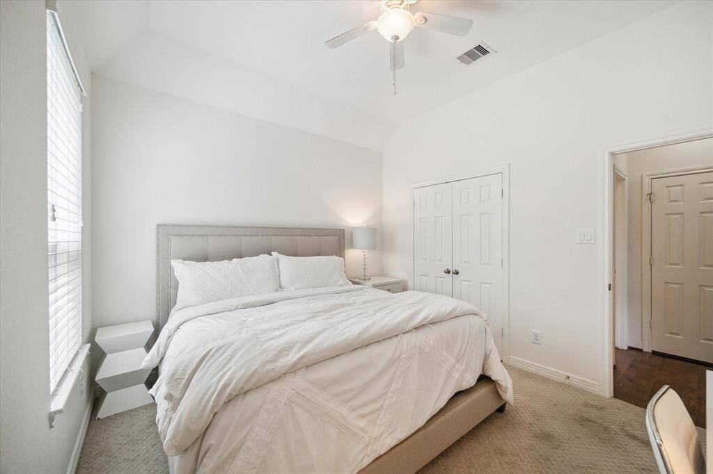 Located in the back right corner of the home, this spacious guest suite offers exceptional privacy and comfort. Large enough to accommodate a king-sized bed, writing desk, and TV, it also features its own private bathroom—perfect for overnight guests or multigenerational living.