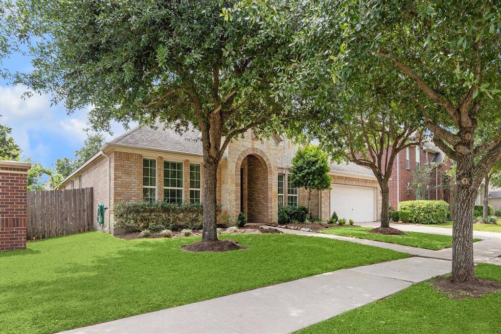 Located in a peaceful part of a popular master-planned community, this rare single-story home offers no back neighbors and sits next to the mailboxes for added convenience. The open-concept kitchen and living area boasts an oversized island, plus a flexible space perfect for a home office or breakfast nook. With a game room, media room, and private bedroom layout, it’s designed for both entertainment and quiet retreat.