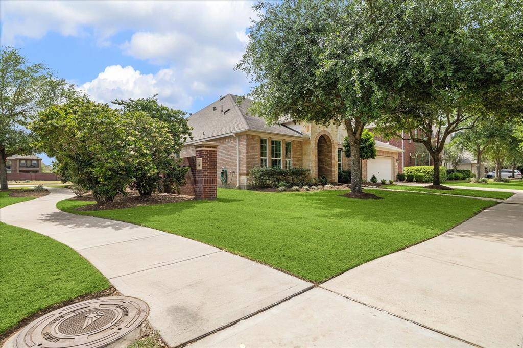 Located in a peaceful part of a popular master-planned community, this rare single-story home offers no back neighbors and sits next to the mailboxes for added convenience. The open-concept kitchen and living area boasts an oversized island, plus a flexible space perfect for a home office or breakfast nook. With a game room, media room, and private bedroom layout, it’s designed for both entertainment and quiet retreat.