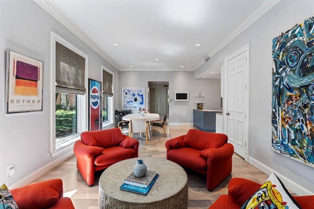 The Family Room with built-in entertainment center, recessed lighting, and access to the garage opens to the Breakfast Room and Kitchen. Great floor plan for today's casual lifestyle.