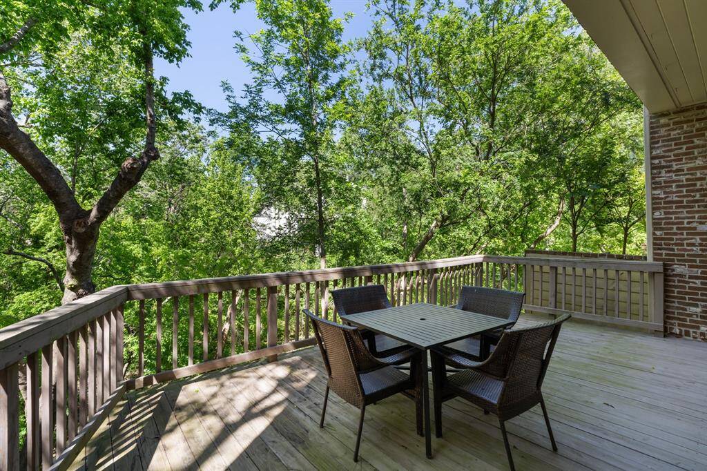 The deck overlooks the ravine, with double French door access from the Living Room.  Great place for your morning coffee and newspaper to enjoy the serene natural views.