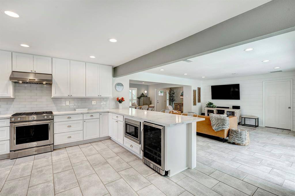 Under-counter microwave and beverage fridge; ample storage