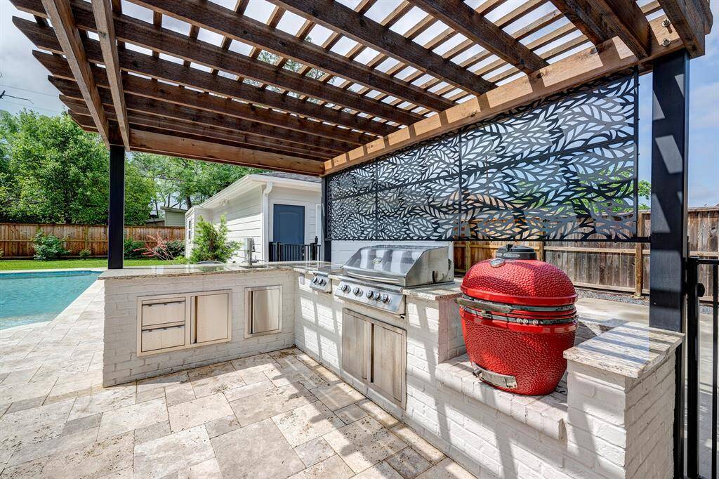 Summer kitchen with sink, storage, gas grill AND komodo grill