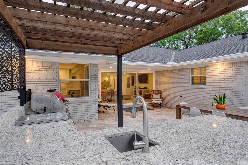 Summer kitchen with sink, storage, gas grill AND komodo grill