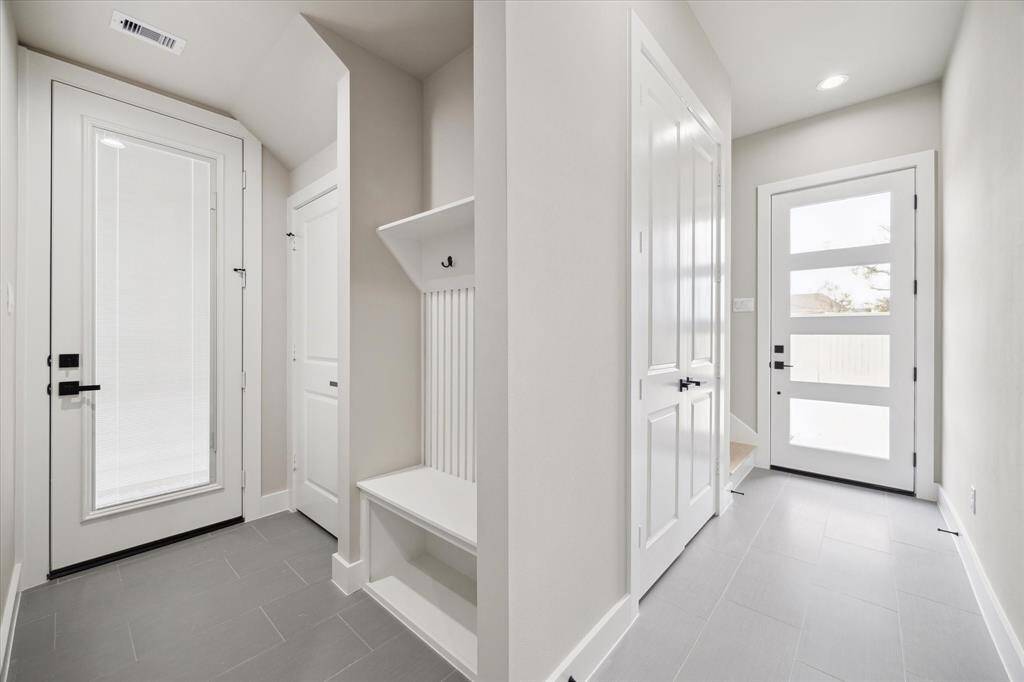 Entrance, coat closet and side door