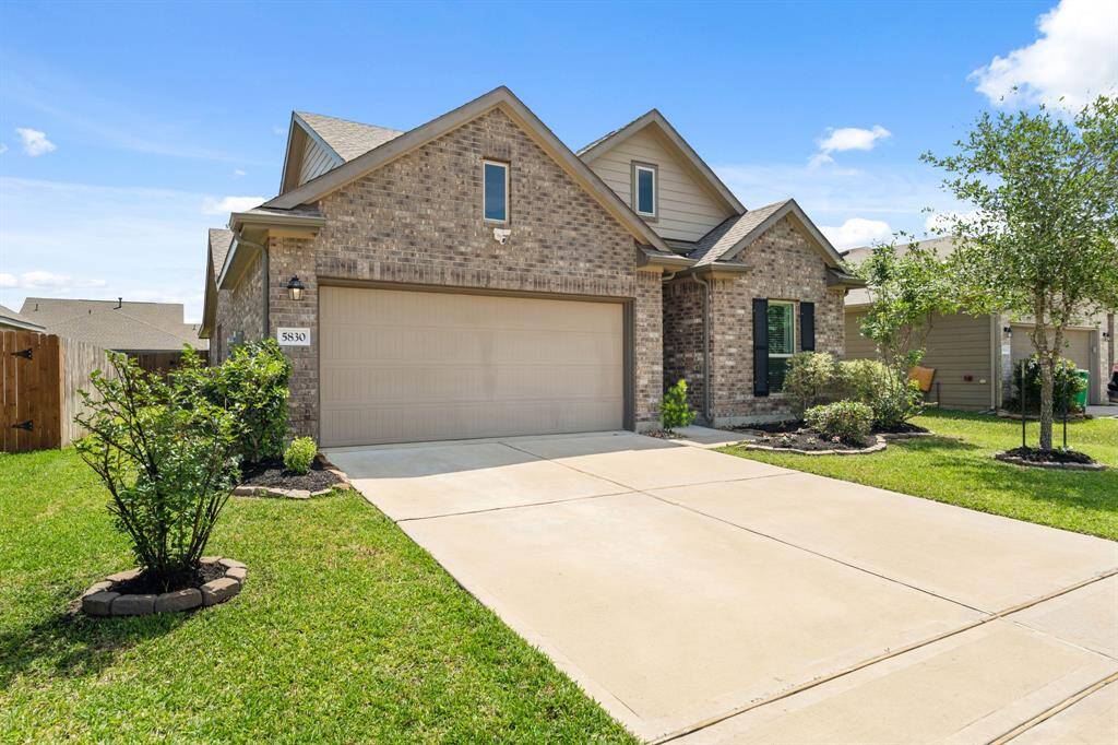 2-car garage and ample driveway for guest parking.