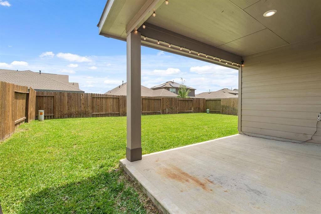 Back porch great for outdoor grilling and seating!