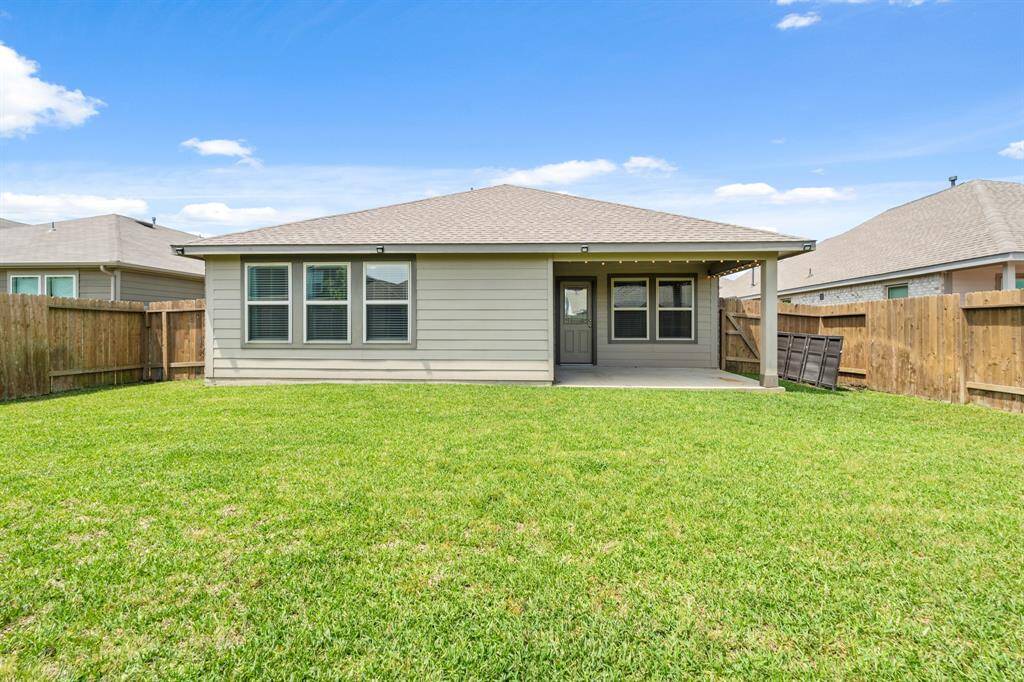 Backyard big enough for the kids or pets to play!