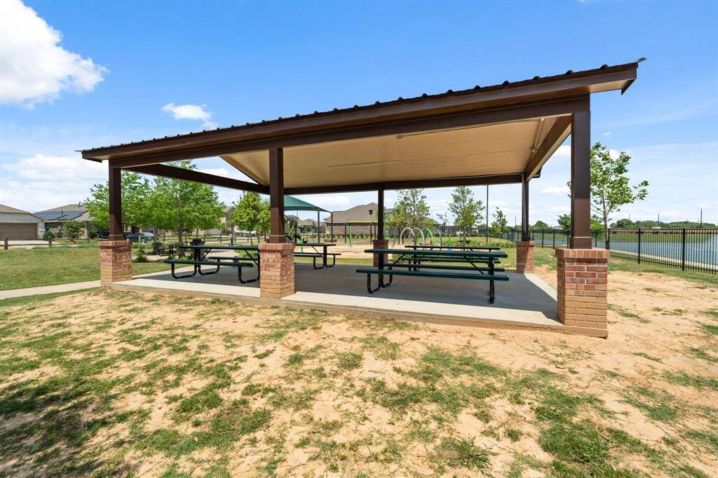 Covered picnic area with bbq set up for family and friends to gather.