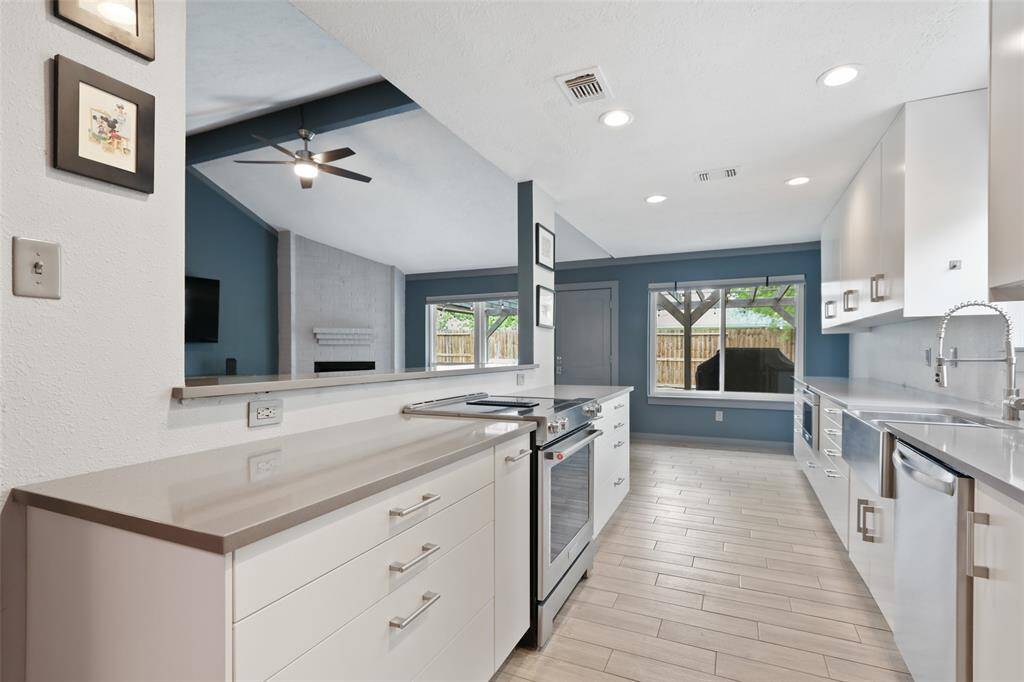The large double pane windows allow natural sunlight to brighten the room.