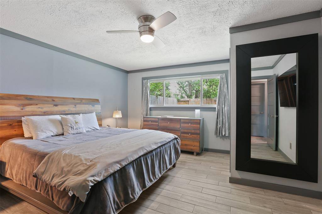 The primary bedroom provides private and spacious accommodations.