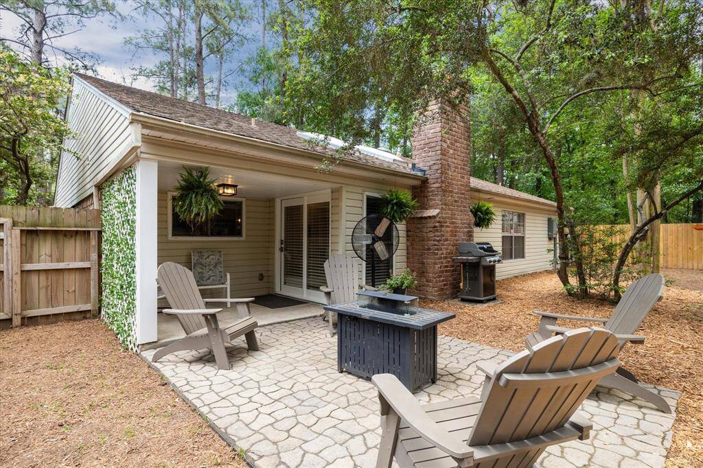Unwind after a long day under your covered back patio, or enjoy an evening under the stars. This backyard is perfect for relaxing outdoors year-round.