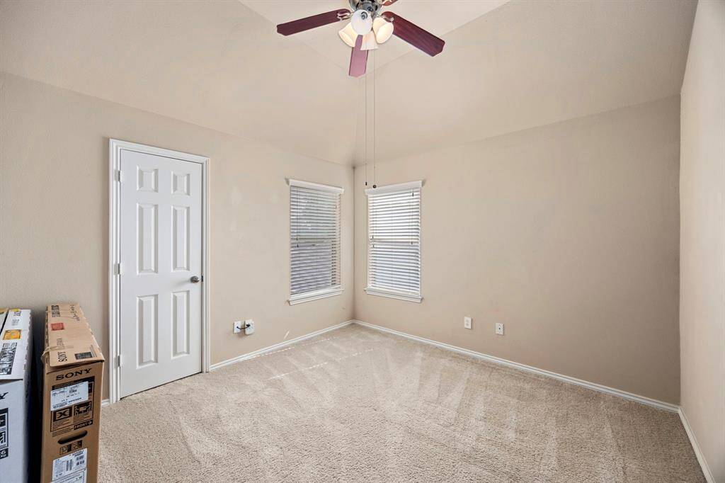 Bedroom #2 features include a ceiling fan, two windows, and a spacious closet.
