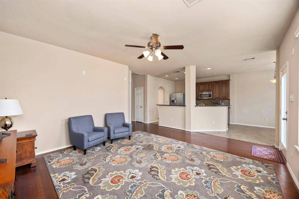 The living space, Kitchen, and breakfast room.