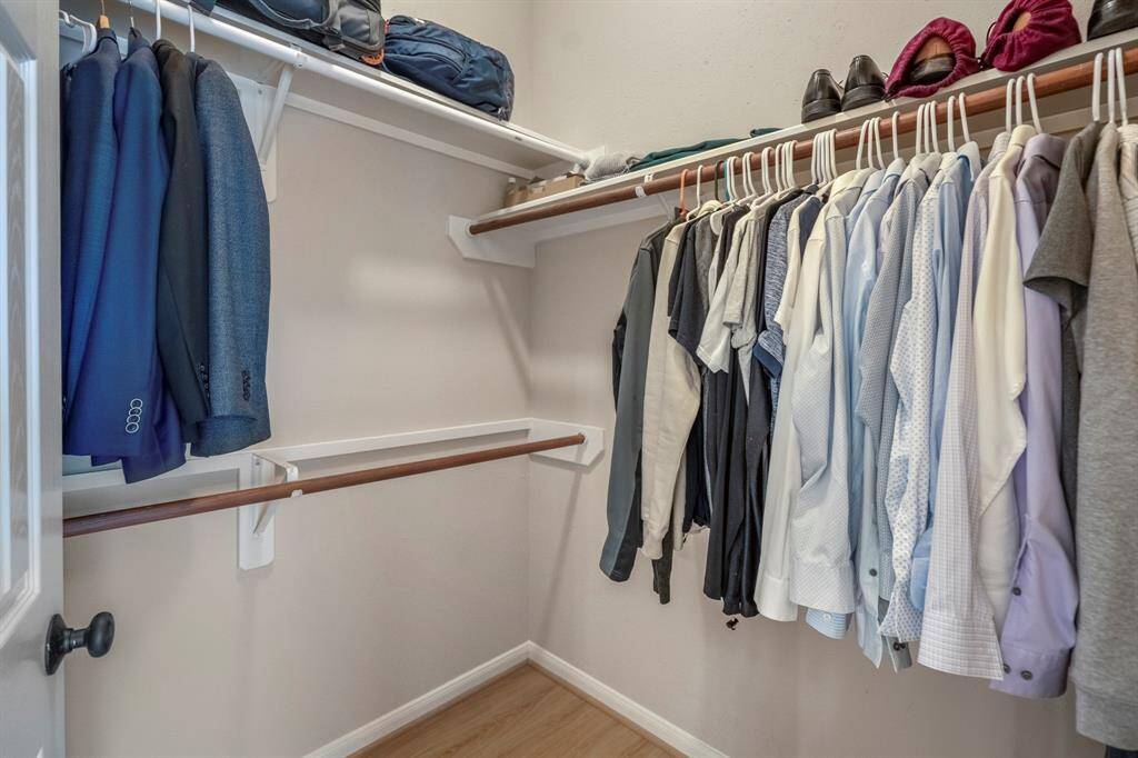 Inside the second walk-in closet, you'll find even more spacious hanging room, providing ample storage for your wardrobe and keeping everything neatly organized.