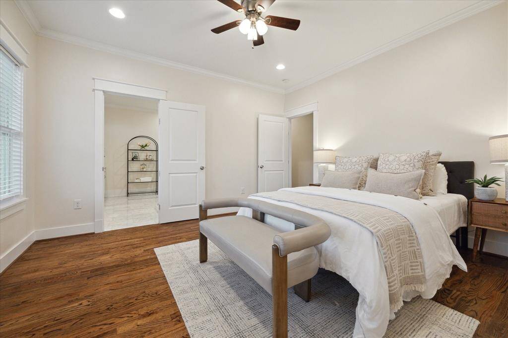 Spacious primary bedroom with ample natural light.