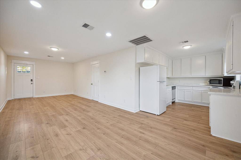 Attached but separate entry for 1 bed/1 bath income producing apartment unit.